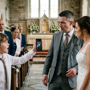 The Boy Stopped The Wedding With A Cracked Phone. Then The Groom Learned His Former Assistant Had Died Carrying The Truth